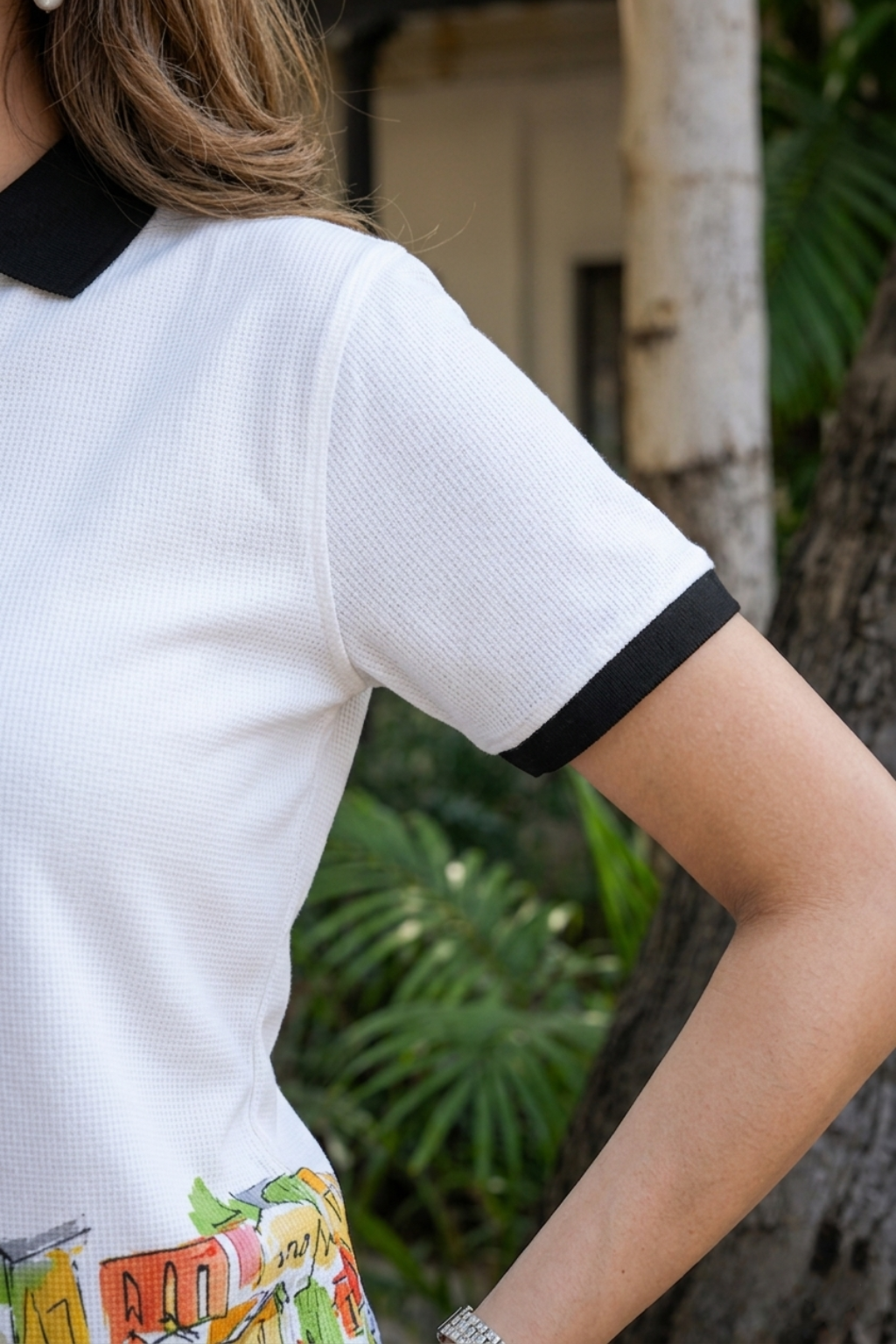 Women White Urban Art Printed Polo T-Shirt with Black Collar