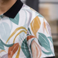 Tshirtsbuddy Men's Tropical Leaf & Feather Print Polo T-Shirt