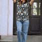 Women Blue Ikat Printed Polo T-Shirt with Black Collar